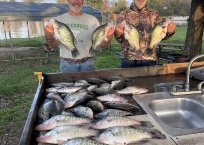 duo holding fish