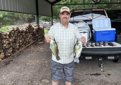 man holding fish in both hands