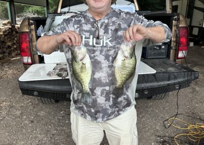 man holding fish in both hands